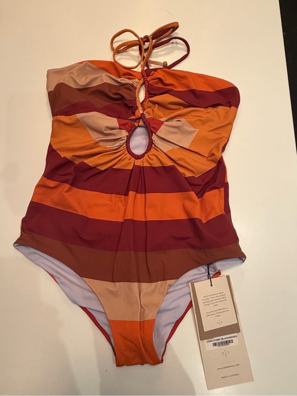 Cala de la Cruz Striped Cutout One-Piece Swimsuit in Rust, Red & Tan